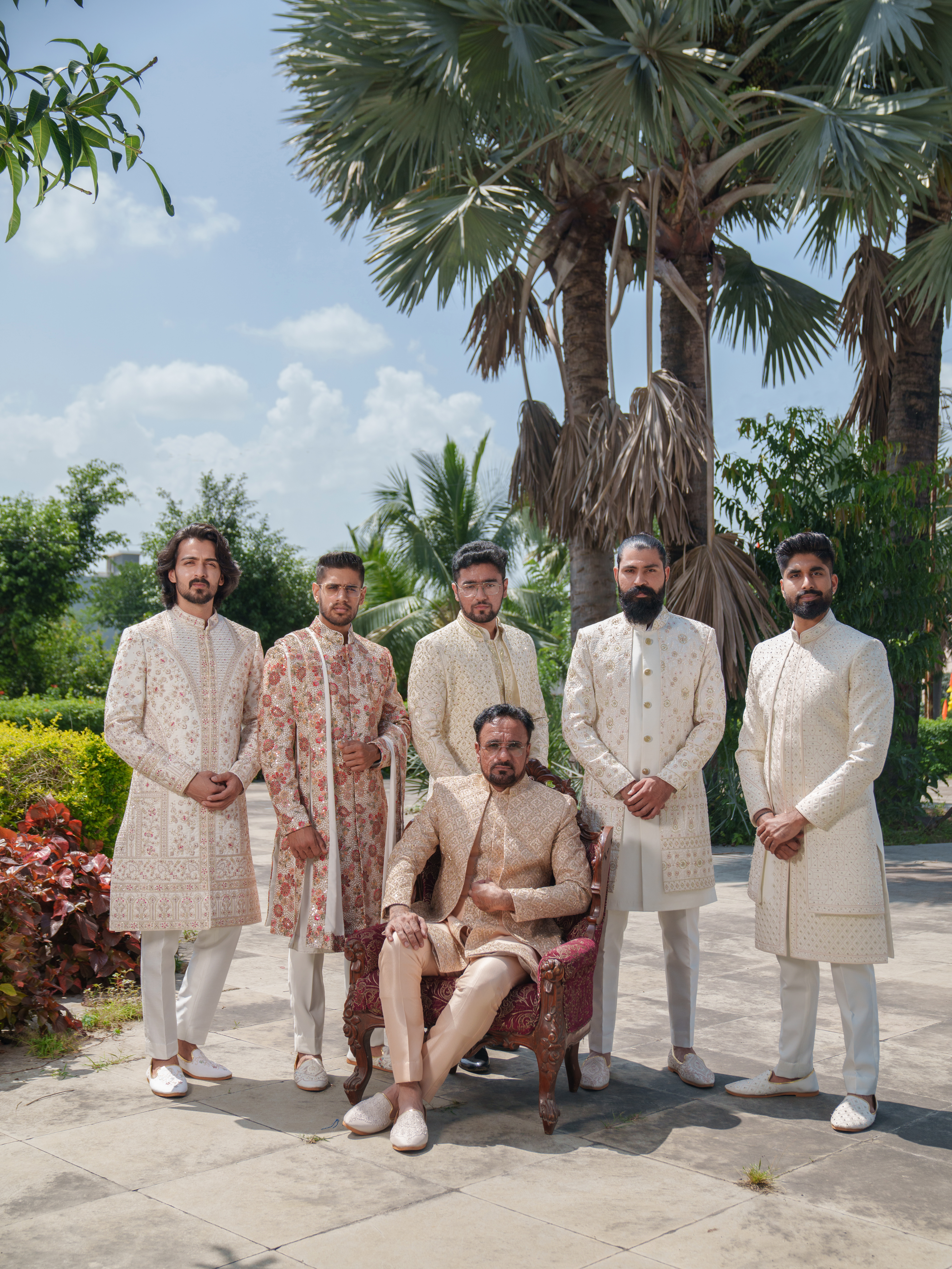 Model in a jewel-toned Indowestern kurta with geometric patterns